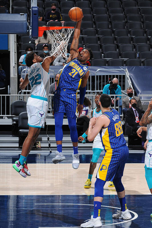 Kelan Martin Poster featuring the photograph Play-In Tournament - Charlotte Hornets v Indiana Pacers #3 by Ron Hoskins