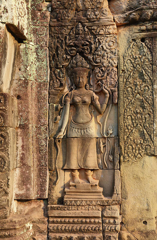 Cambodia Poster featuring the photograph Ancient bas-reliefs on temple in Cambodia by Mikhail Kokhanchikov