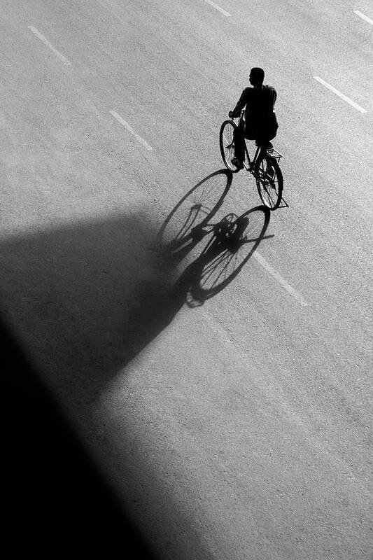 Minimalism Poster featuring the photograph Bicycle Shadow Vs Shadow Triangle by Prakash Ghai