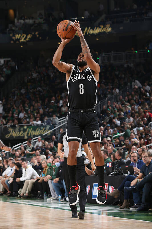 Patty Mills Poster featuring the photograph Brooklyn Nets v Milwaukee Bucks by Gary Dineen