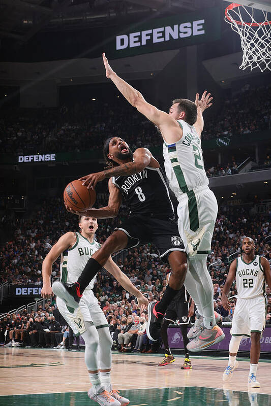Patty Mills Poster featuring the photograph Brooklyn Nets v Milwaukee Bucks by Nathaniel S. Butler