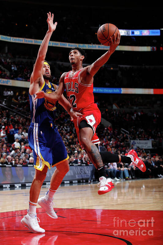 Cameron Payne Poster featuring the photograph Cameron Payne and Klay Thompson by Jeff Haynes