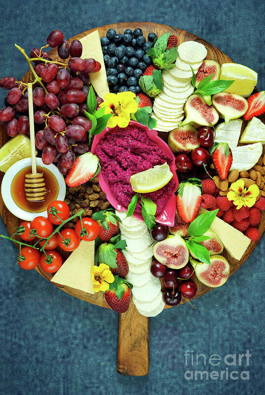 Food Poster featuring the photograph Cheese and fruit charcuterie dessert grazing platter on wooden board. by Milleflore Images