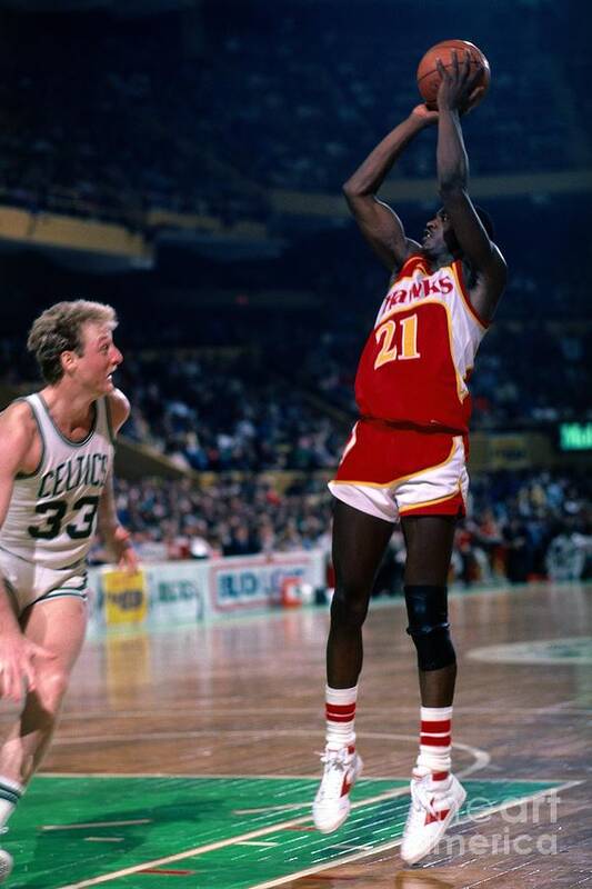 1980-1989 Poster featuring the photograph Dominique Wilkins and Larry Bird by Dick Raphael