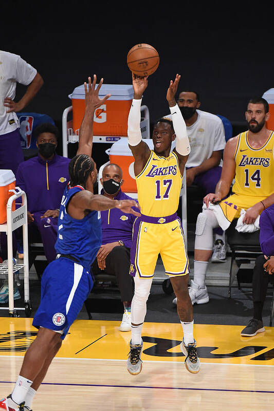 Dennis Schroder Poster featuring the photograph LA Clippers v Los Angeles Lakers by Adam Pantozzi