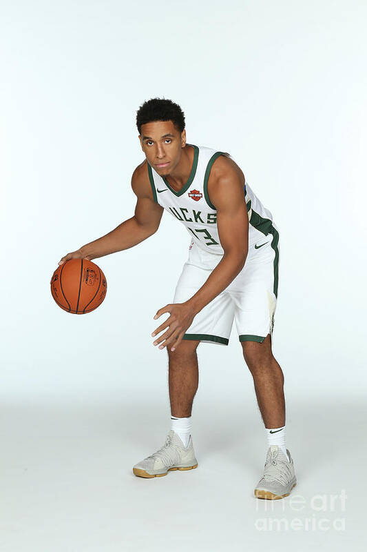 Malcolm Brogdon Poster featuring the photograph Malcolm Brogdon by Gary Dineen