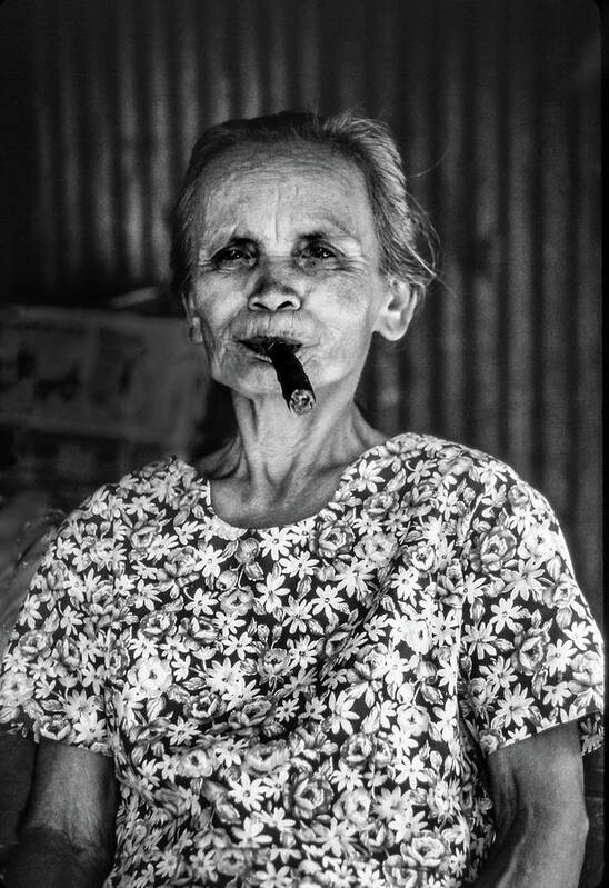 Filipina Poster featuring the photograph Old lady smoking cigar by Jeremy Holton