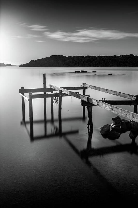 Sunset Poster featuring the photograph Pier Structure And Reflections in Black and White by Nicklas Gustafsson