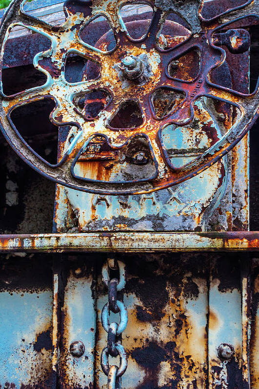 Clev Poster featuring the photograph Rusting Wheel by Stewart Helberg