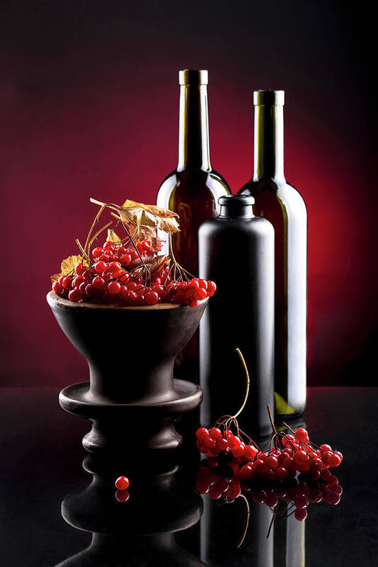 Still Life Poster featuring the photograph Still life with berries of viburnum red and bottles by Valentin Ivantsov