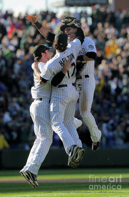 Celebration Poster featuring the photograph Todd Helton, Ian Stewart, and Troy Tulowitzki by Doug Pensinger