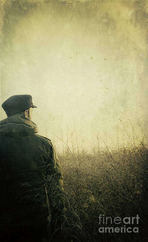 Caucasian Poster featuring the photograph Man alone in Autumn field #1 by Sandra Cunningham