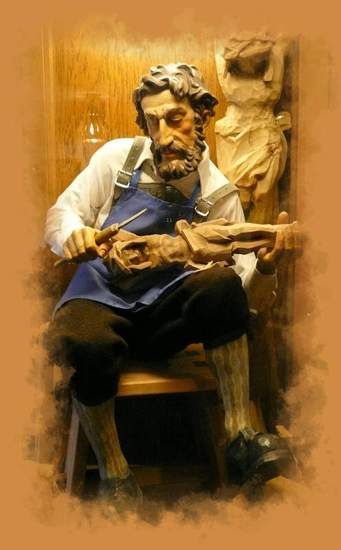 Wood Poster featuring the photograph The Wood Carver by Lori Seaman