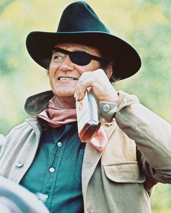 True Grit Poster featuring the photograph John Wayne in True Grit #1 by Silver Screen