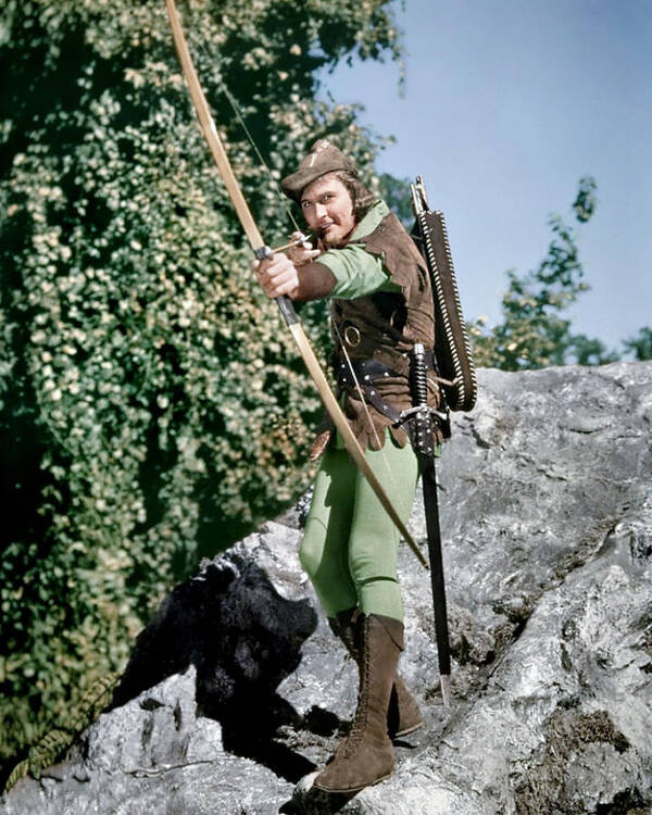 The Adventures Of Robin Hood Poster featuring the photograph Errol Flynn in The Adventures of Robin Hood #3 by Silver Screen