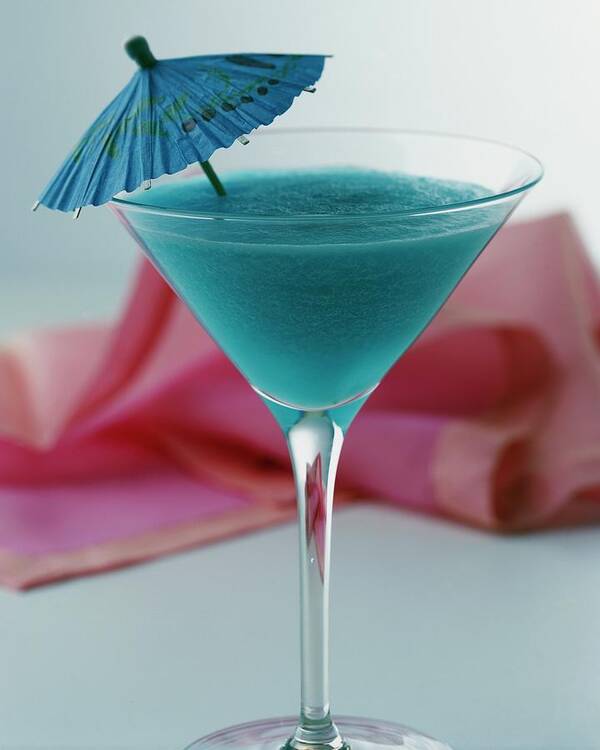 Beverage Poster featuring the photograph A Blue Hawaiian Cocktail by Romulo Yanes