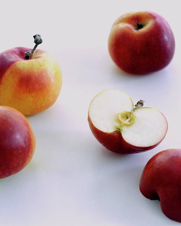 Fruits Poster featuring the photograph A Group Of Apples by Romulo Yanes