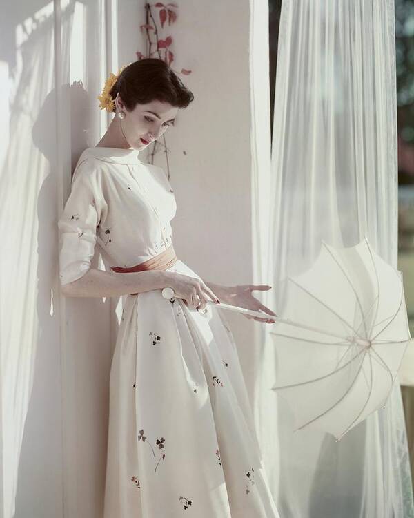 Fashion Poster featuring the photograph A Model Holding A Parasol by Horst P. Horst