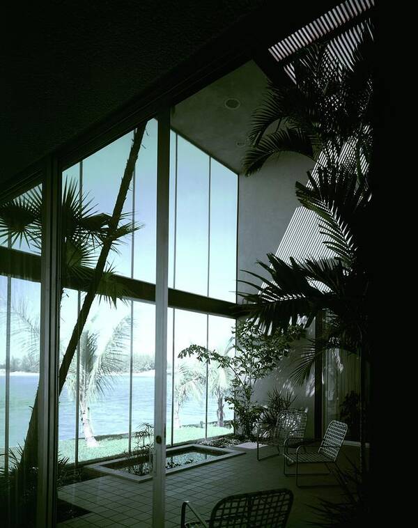 Architecture Poster featuring the photograph A Screened Patio by Robert M. Damora