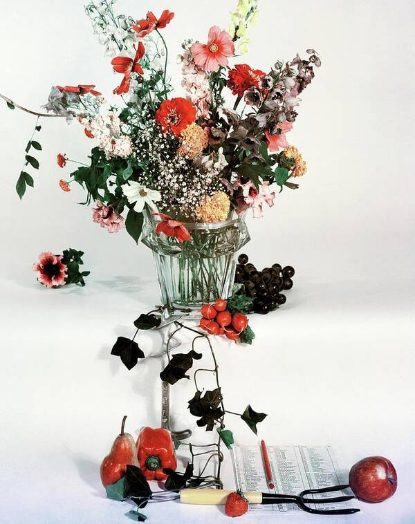 Nobody Poster featuring the photograph A Studio Shot Of A Vase Of Flowers And A Garden by Herbert Matter