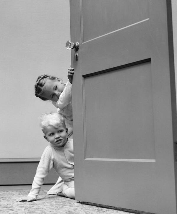 1940s Poster featuring the photograph Children Peeking Around Door, C.1940s by H. Armstrong Roberts/ClassicStock
