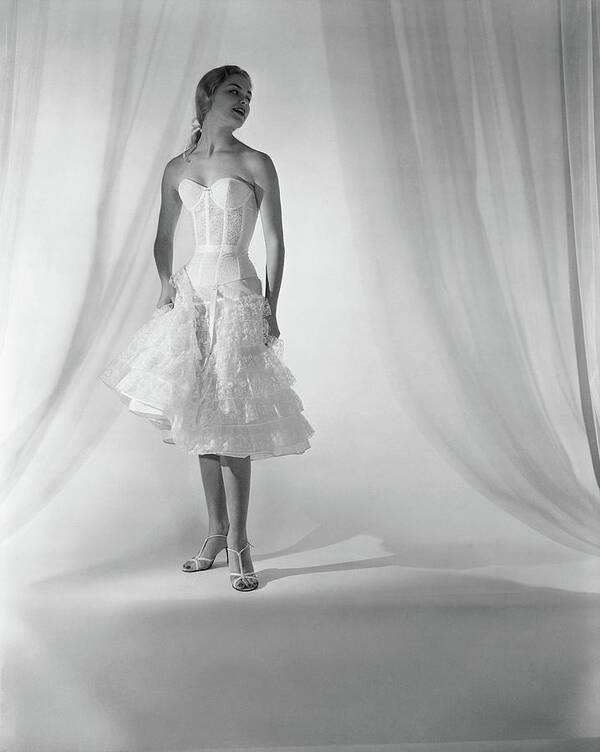 Studio Shot Poster featuring the photograph Model Wearing Corset And Petticoat by Horst P. Horst