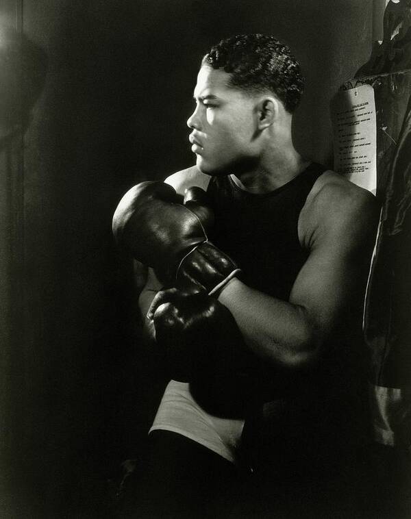 Sports And Activities Poster featuring the photograph Portrait Of Professional Boxer Joe Louis by Lusha Nelson
