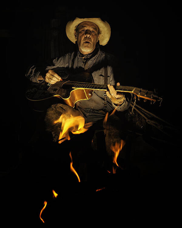 Cowboy Poster featuring the photograph The Last Cowboy Song by Ron McGinnis