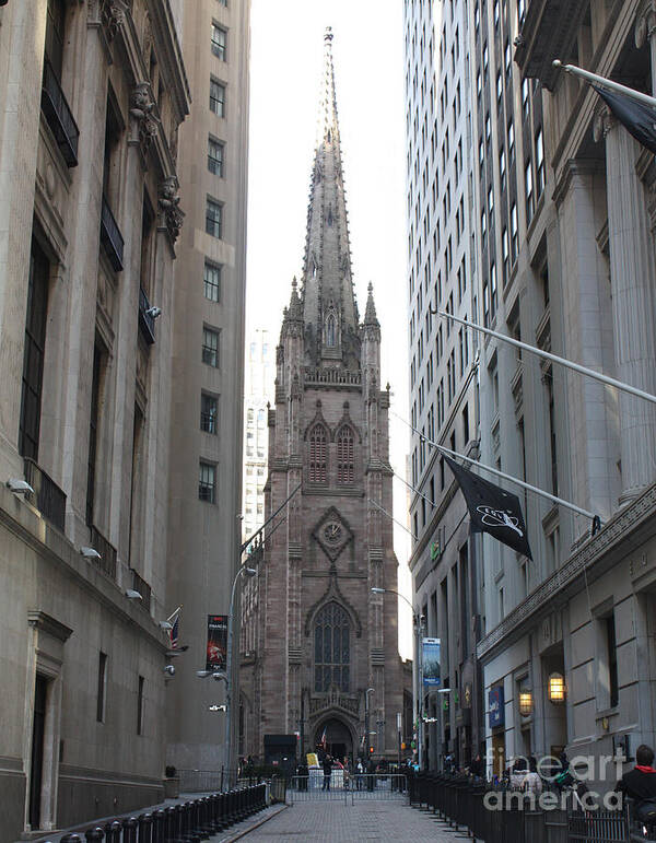 Wall Street Leading To Trinity Church Poster featuring the photograph Wall Street leading to Trinity Church by John Telfer