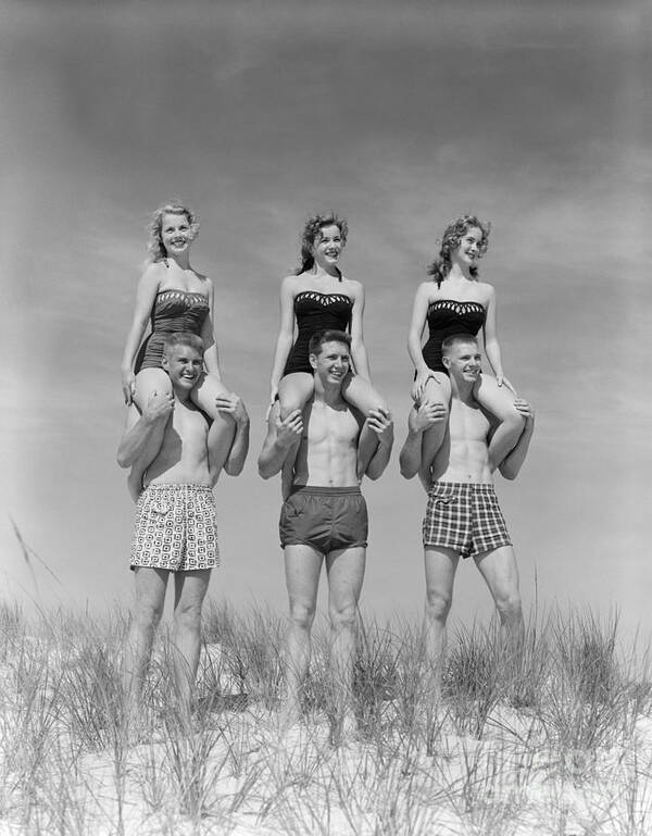 1950s Poster featuring the photograph Beach Balancing Act, 1950s-60s by H Armstrong Roberts and ClassicStock