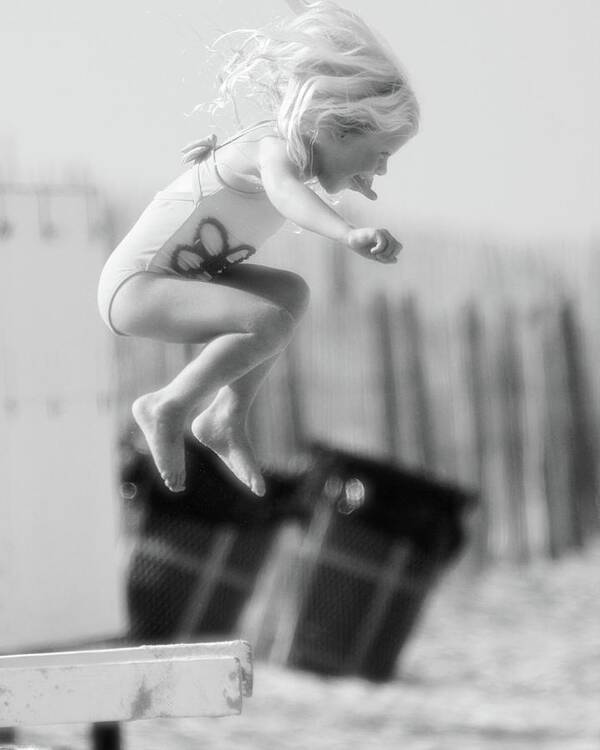 Beach Shore Delaware Maryland Ocean Sand Sun Summer Young Youth Ir Infrared Black White Girl Hot Play Playing Jump Jumping Laughing Hair Fun Poster featuring the photograph Jumping in the Sand #34 by Raymond Magnani