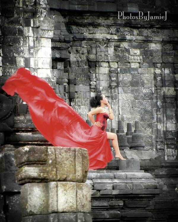 Red Poster featuring the photograph Red Lady at Candi Sewu by Jamie Johnson