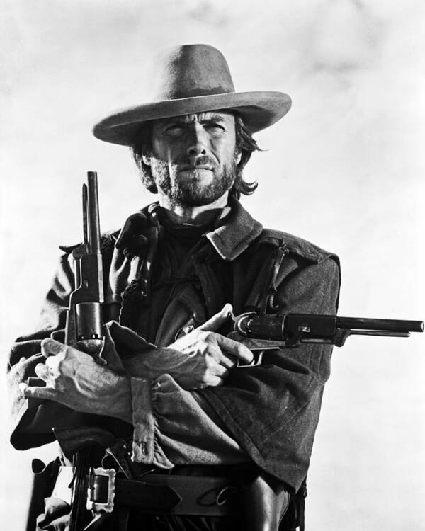 Clint Eastwood Poster featuring the photograph Clint Eastwood In The Outlaw Josey Wales by Globe Photos