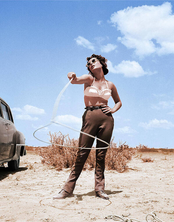 1950s Poster featuring the photograph Elizabeth Taylor With Lasso by Frank Worth