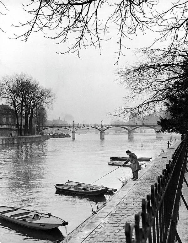 Seine Poster featuring the photograph Fisherman on the Seine by Ed Clark