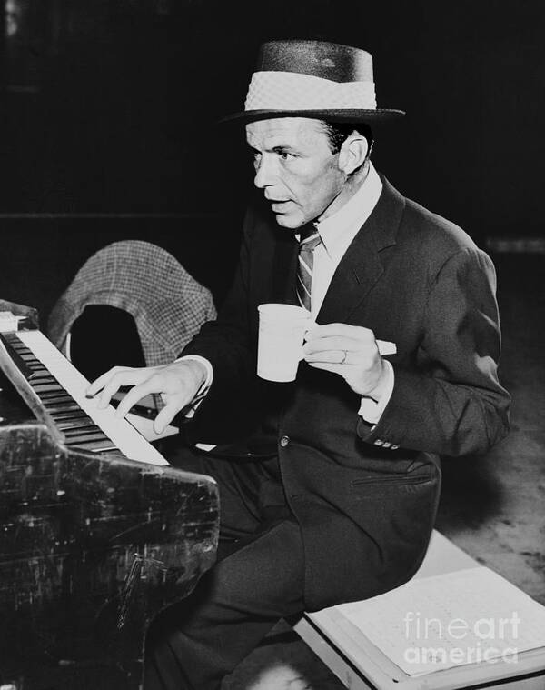Working Poster featuring the photograph Frank Sinatra Playing Piano by Bettmann