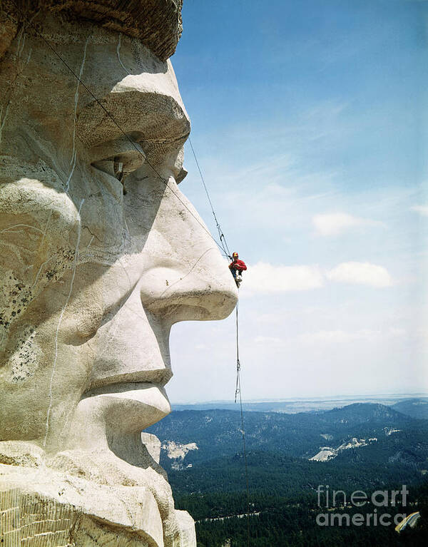 Working Poster featuring the photograph Mount Rushmore Repairman Working by Bettmann