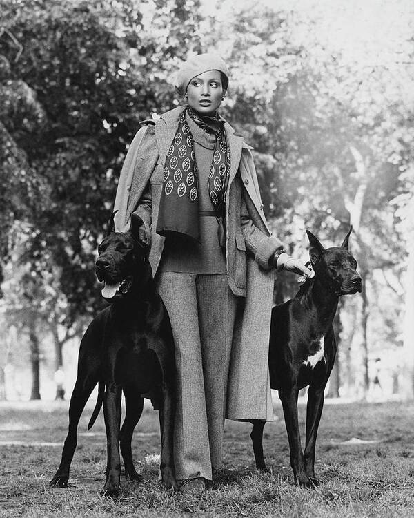 Accessories Poster featuring the photograph Model Beverly Johnson With Two Great Danes by Francesco Scavullo
