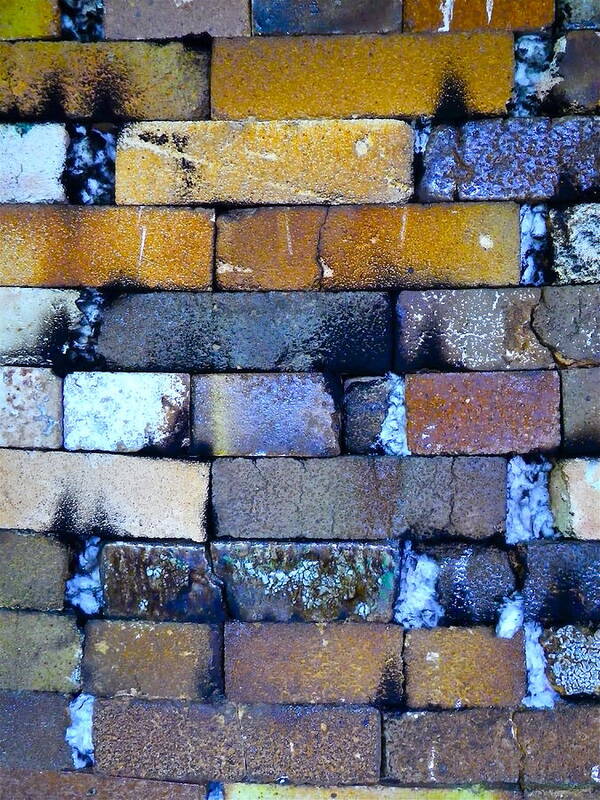 Brick Wall Poster featuring the photograph Brick Wall of a Pottery Kiln by Anna Ruzsan