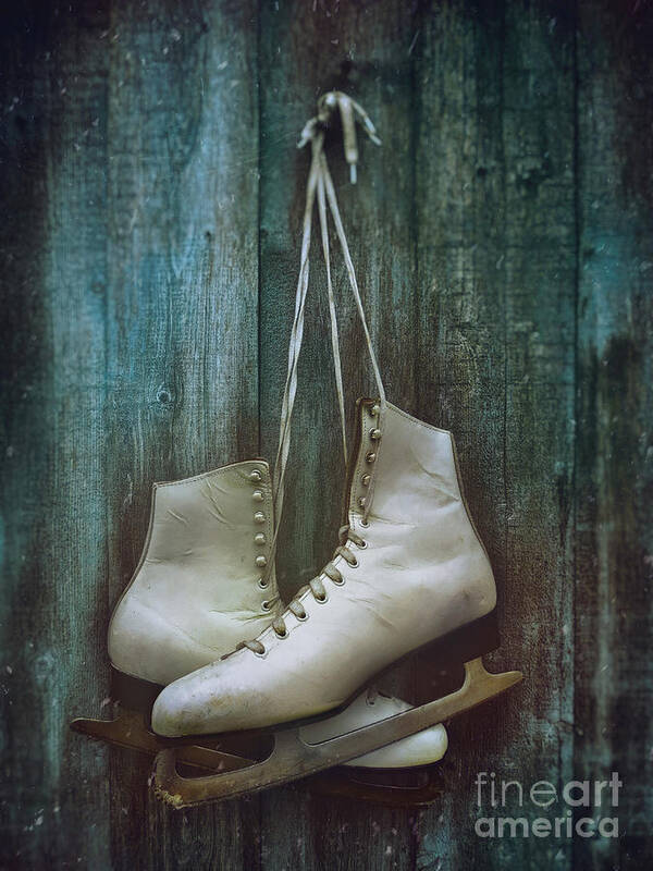 Alone Poster featuring the photograph Old pair of woman's skates hung on barn door       by Sandra Cunningham