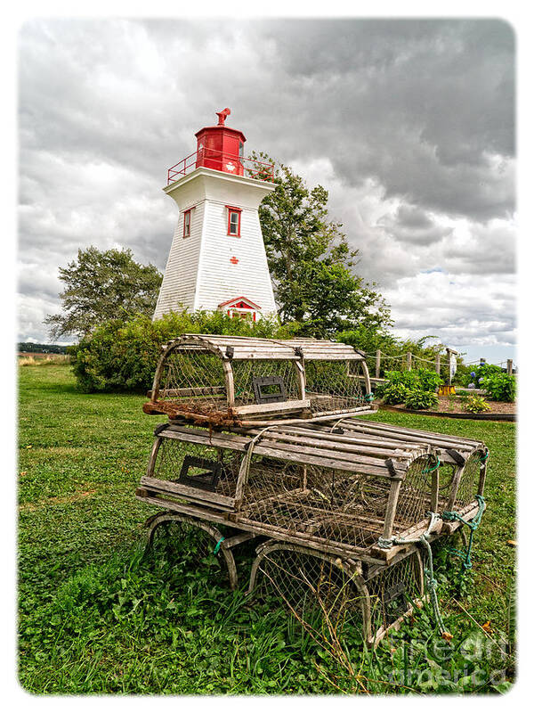 Lighthouse Poster featuring the photograph Prince Edward Island Lighthouse with Lobster Traps by Edward Fielding