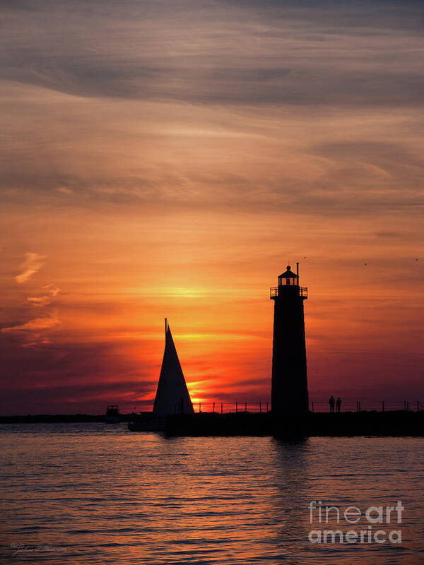 Sailboat Poster featuring the photograph Sun set at the Muskegon Lighthouse by John Harmon