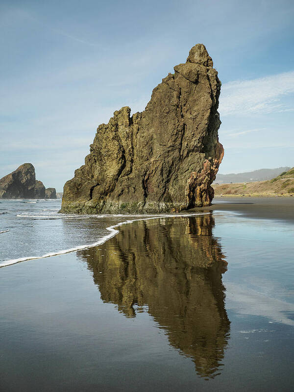 Oregon Poster featuring the photograph Ariya's Beach Reflections on Sea Stack by Greg Nyquist