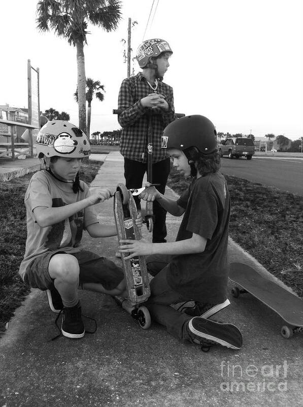 Skateboard Poster featuring the photograph Fixing a skooter by WaLdEmAr BoRrErO