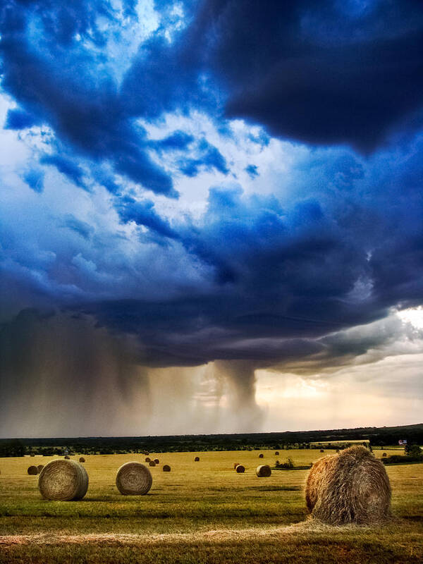Storm Poster featuring the photograph Hay in the Storm by Eric Benjamin