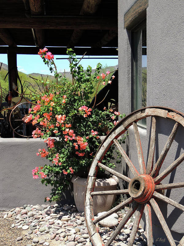 Gift Shop Poster featuring the photograph Old Wagon Wheel by Gordon Beck