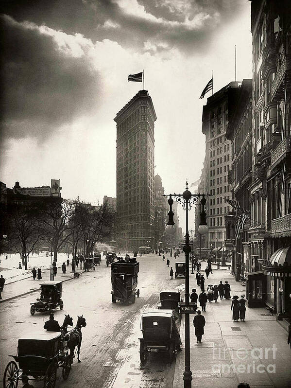Times Square Poster featuring the photograph The Flatiron Building by Jon Neidert
