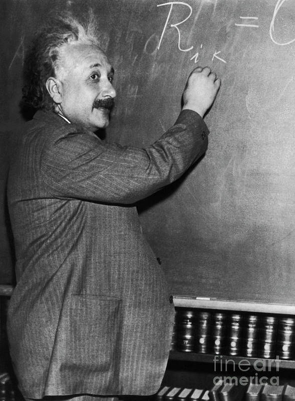 Physicist Poster featuring the photograph Albert Einstein Writing Mathematic by Bettmann