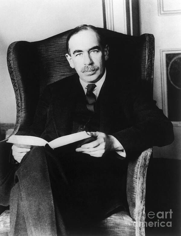 People Poster featuring the photograph J.maynard Keynes Holding A Book by Bettmann