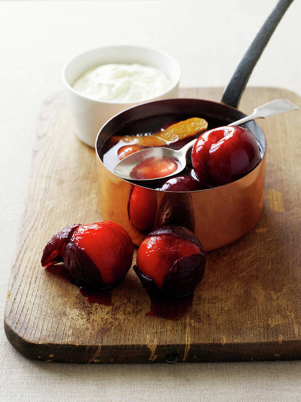 Plum Poster featuring the photograph Pot Of Stewed Plums On Board by Brett Stevens